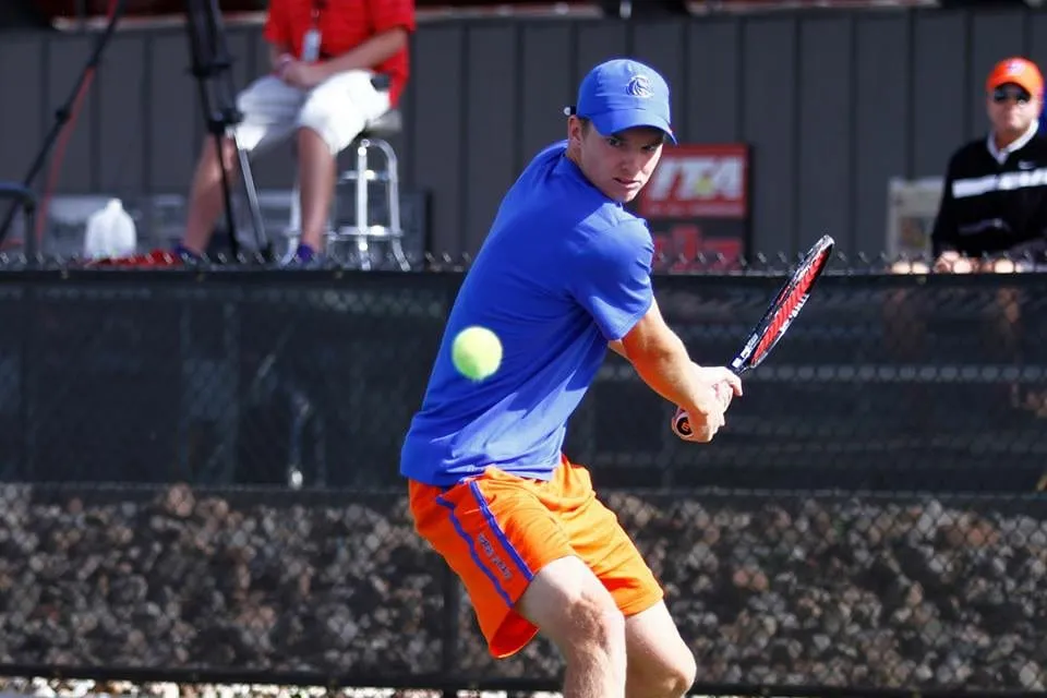 Brian Foley, owner of On Point Court Surfacing, playing competitive tennis